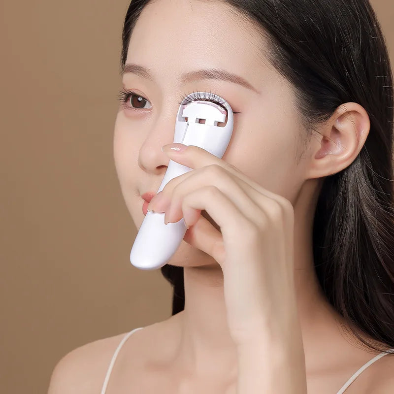 "Portable heated eyelash curler styling lashes for long-lasting curl"