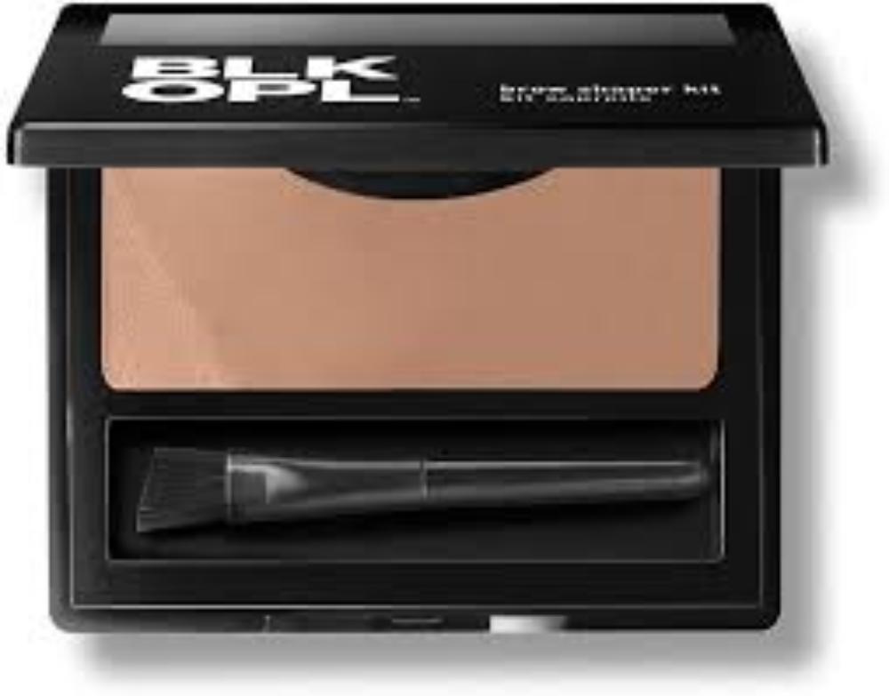 Close-up of brow powders and brush applicator”